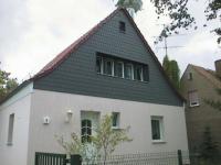 Fassadenverkleidung Zierer Schiefer und VinyTherm Paneele